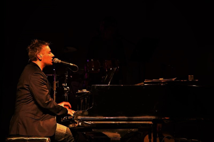 Alan Ryden of The Essential Elton John at the piano