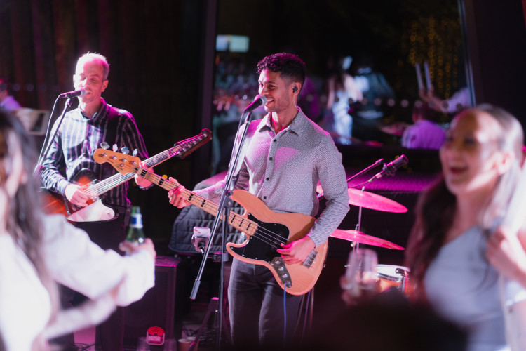 simply groove bassist vocals live stage
