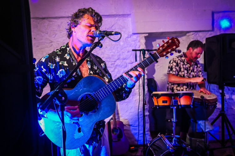 Busta Groove - Singer, Guitarist and Percussionist Performing Live