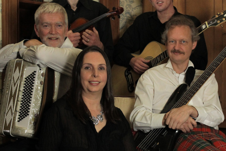 Edinburgh Castle Ceilidh Band with fiddle, accordion and guitars