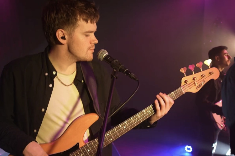 Short Circuit - Bassist Singing While Playing Live